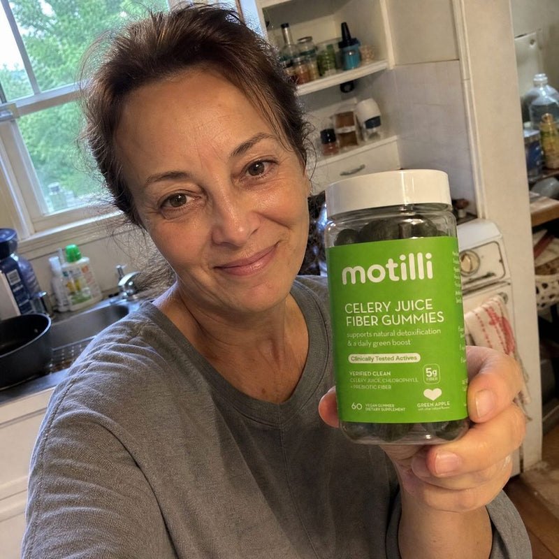 Woman holding a bottle of Motilli