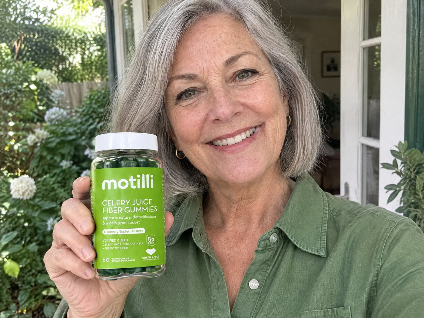 Woman holding a bottle of Motilli